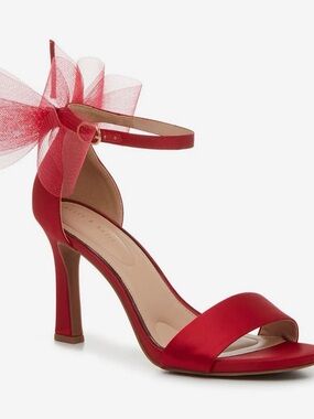 Kelly and Katie Nemira Sandal-Red heels with bow details. 7M